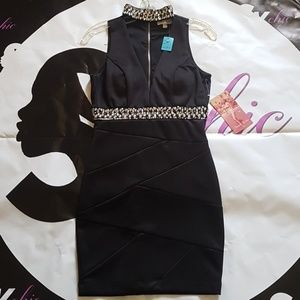 Emerald Sundae black dress with rindstone. New